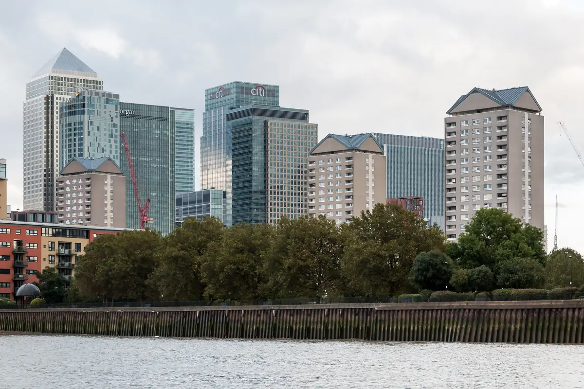 Office towers of Canary Wharf in London seen across the River Thames