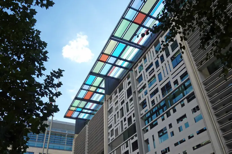 The Home Office building at 2 Marsham Street, London, with its coloured glass canopy, seen from below